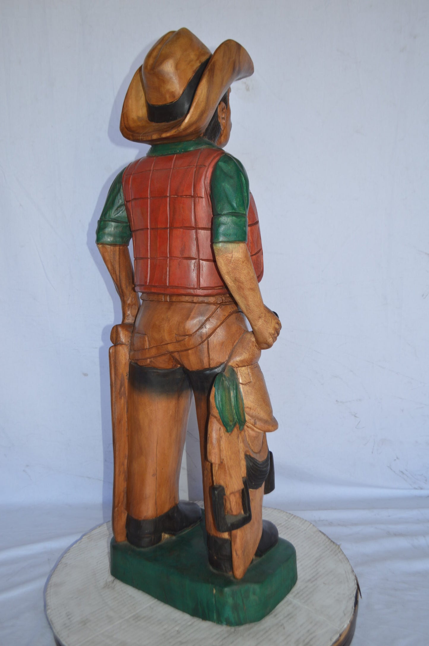 Cowboy Made of Wood Statue - Large - Size: 6"L x 10"W x 31"H.