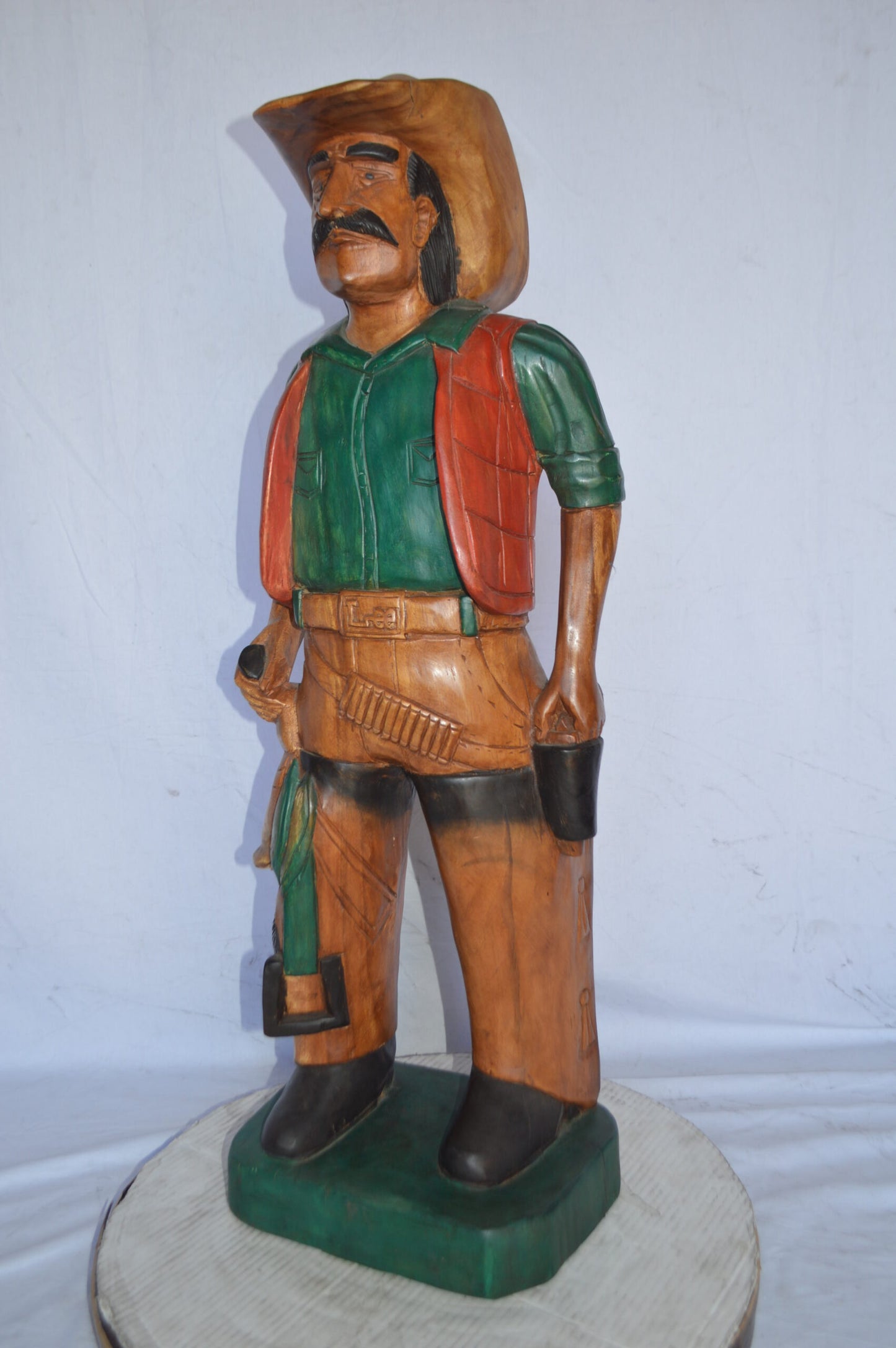 Cowboy Made of Wood Statue - Large - Size: 6"L x 10"W x 31"H.