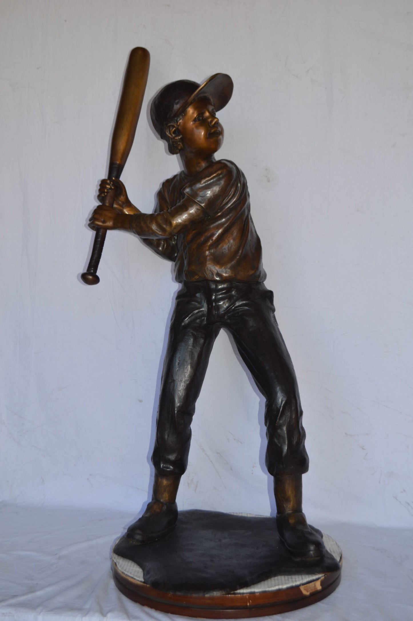 Baseball batter in Action Bronze Statue - Size: 28"L x 24"W x 57"H.