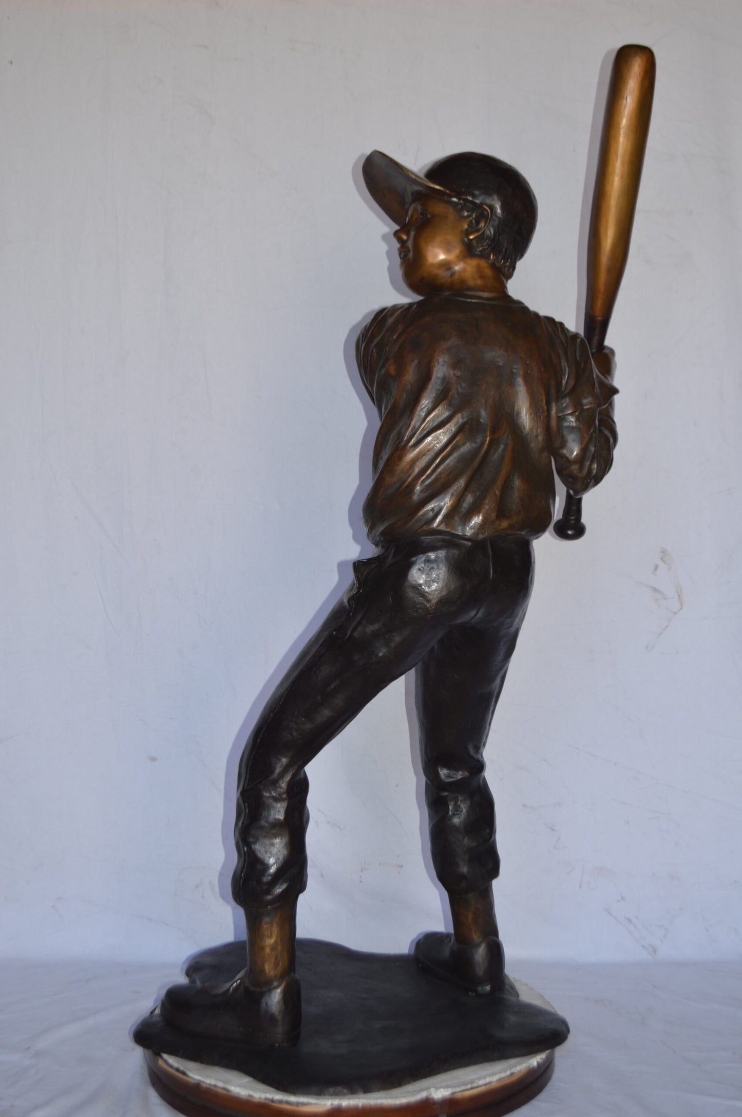 Baseball batter in Action Bronze Statue - Size: 28"L x 24"W x 57"H.