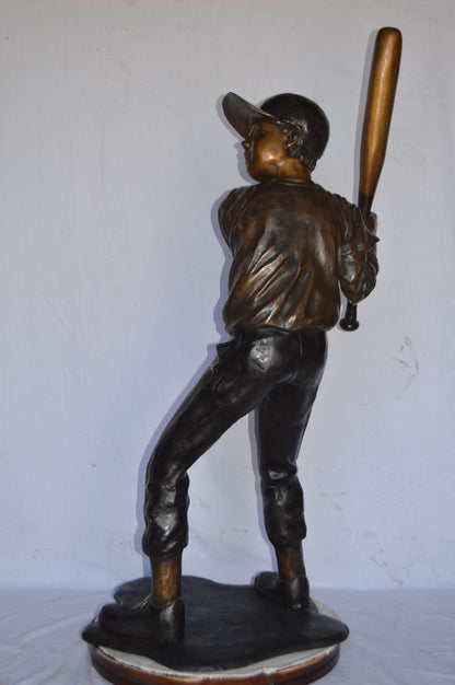 Baseball batter in Action Bronze Statue - Size: 28"L x 24"W x 57"H.
