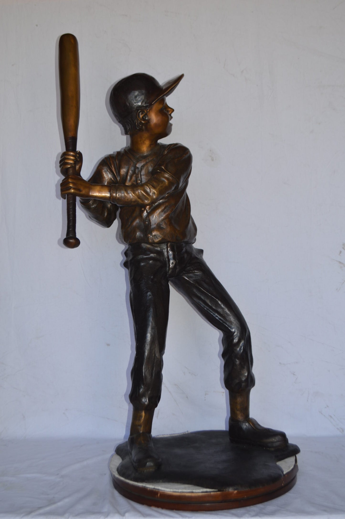 Baseball batter in Action Bronze Statue - Size: 28"L x 24"W x 57"H.