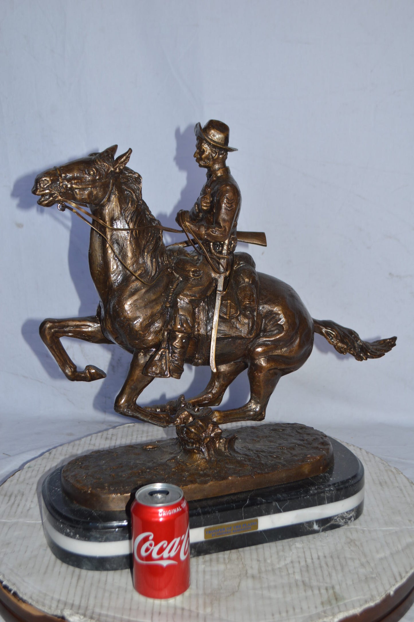 Trooper of the plains Bronze replica by Remington - Size: 20"L x 8"W x 21"H.