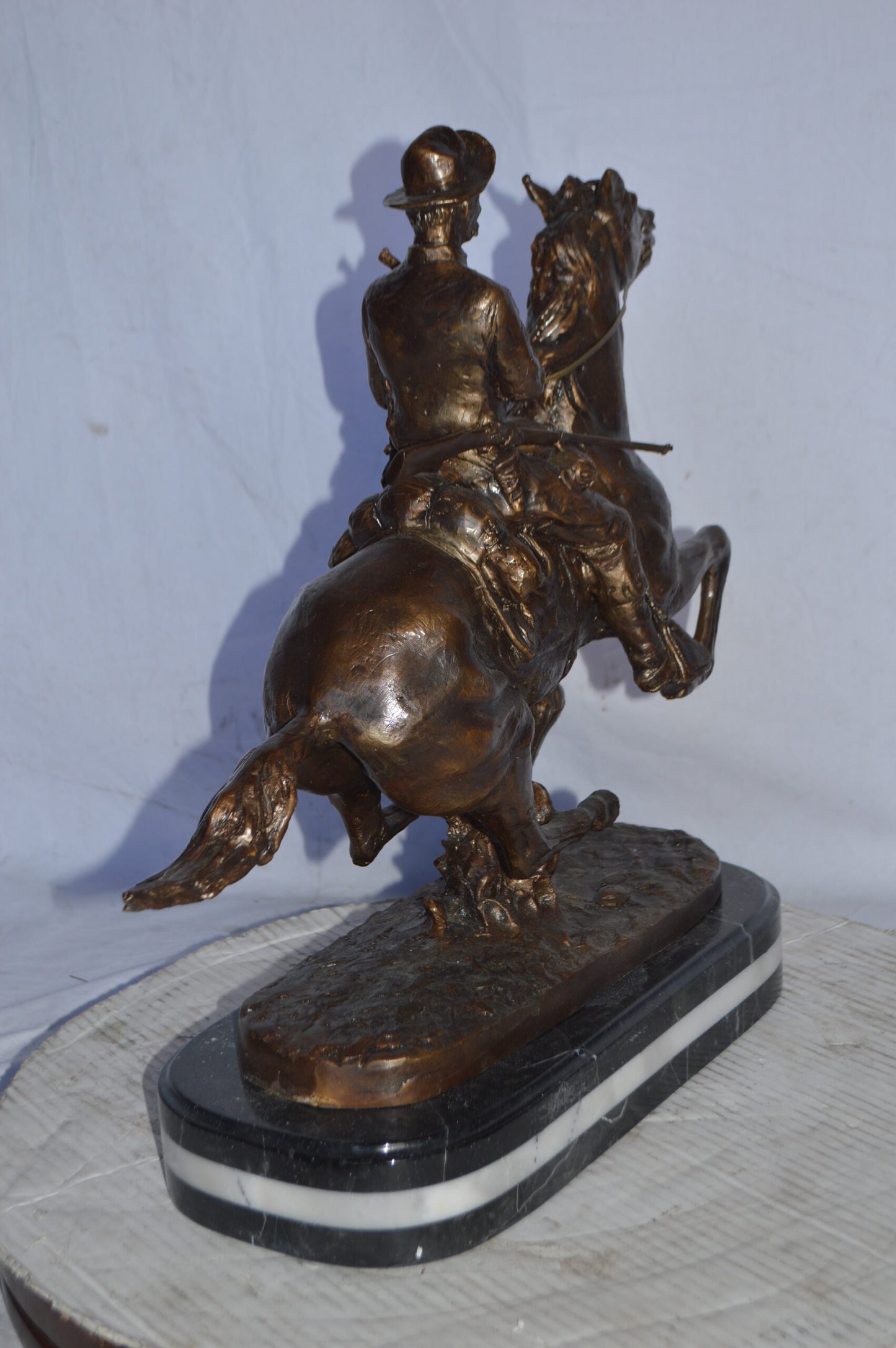 Trooper of the plains Bronze replica by Remington - Size: 20"L x 8"W x 21"H.