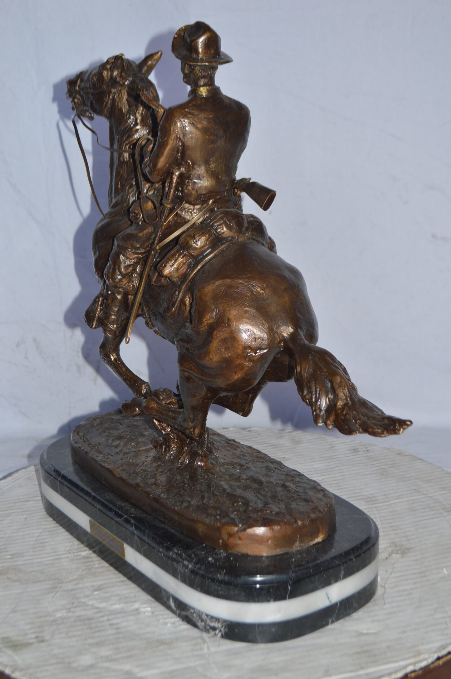 Trooper of the plains Bronze replica by Remington - Size: 20"L x 8"W x 21"H.