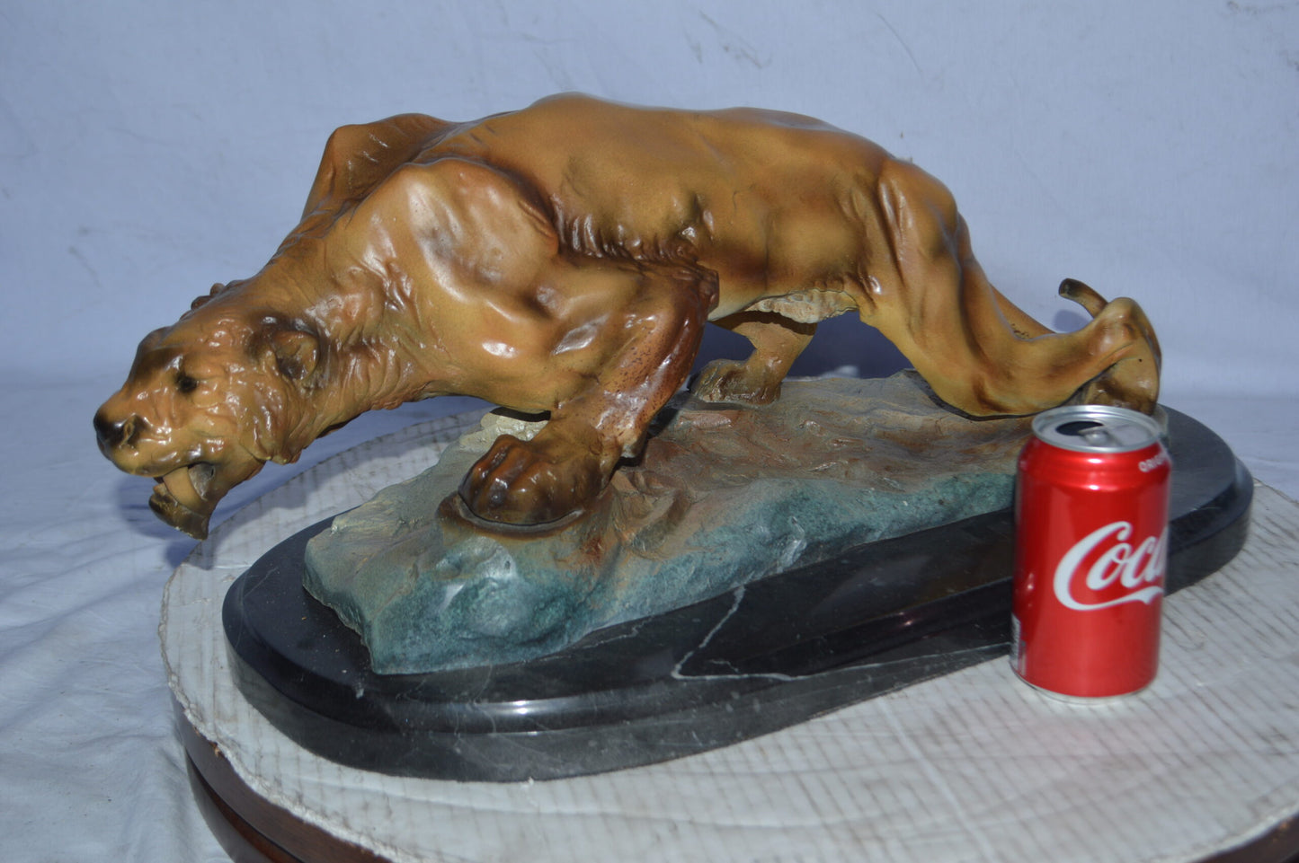 Mountain Lion in action Bronze Statue - Size: 25"L x 11"W x 11"H.
