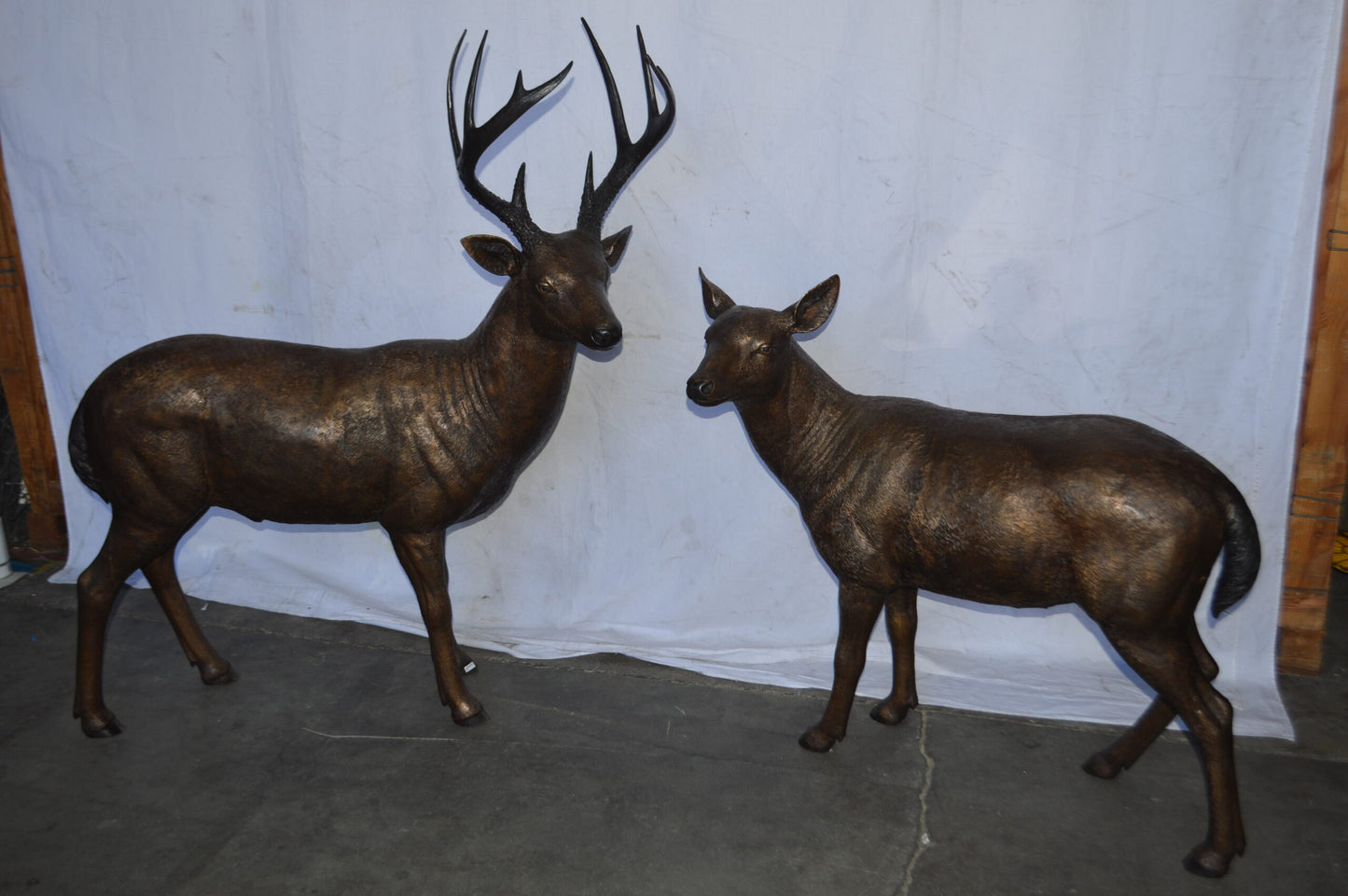 Pair of life size deer bronze statue - Size: 17"L x 44"W x 52"H.
