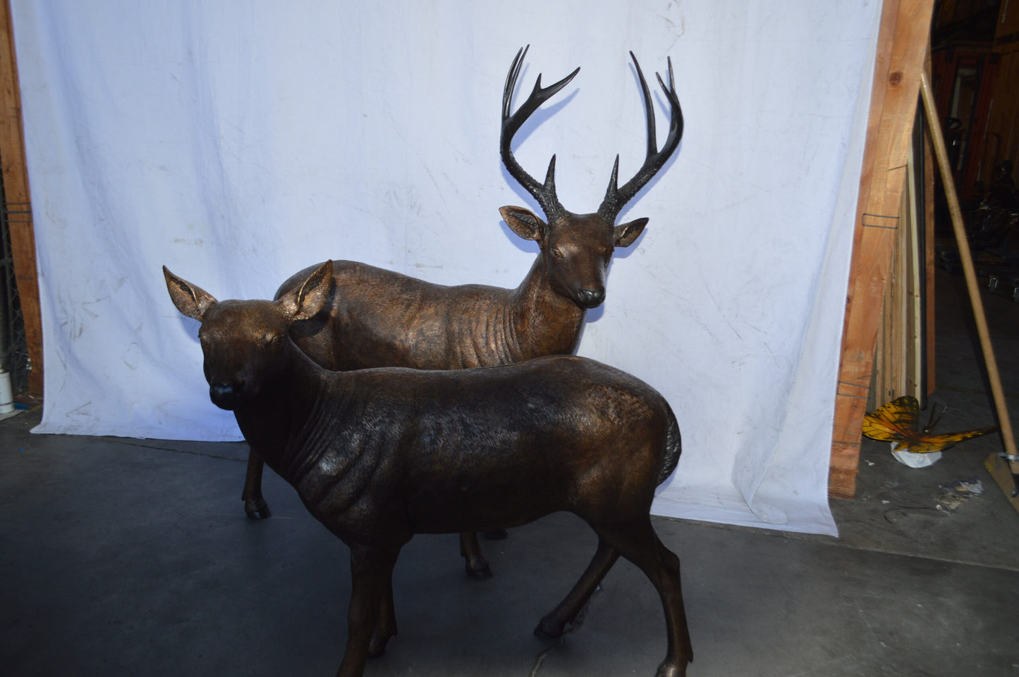 Pair of life size deer bronze statue - Size: 17"L x 44"W x 52"H.