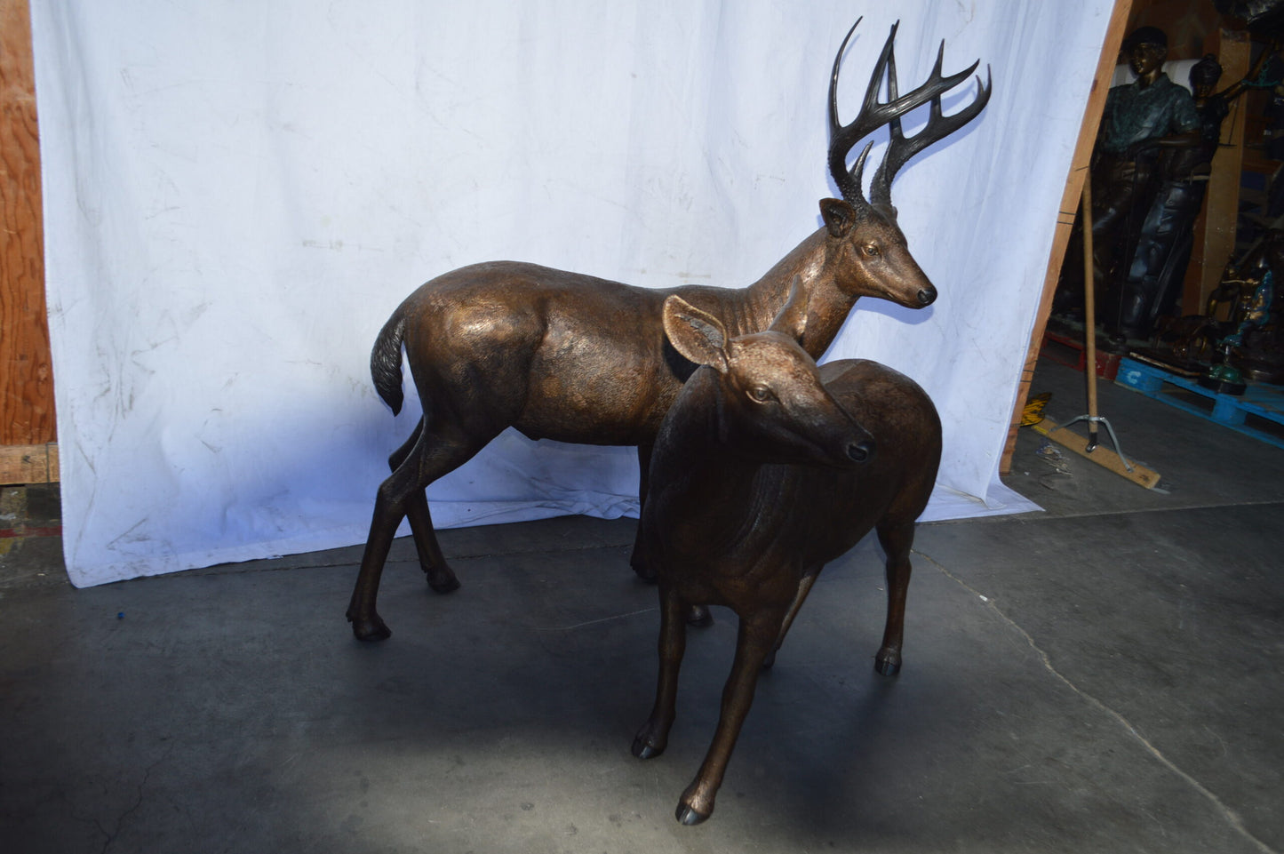 Pair of life size deer bronze statue - Size: 17"L x 44"W x 52"H.