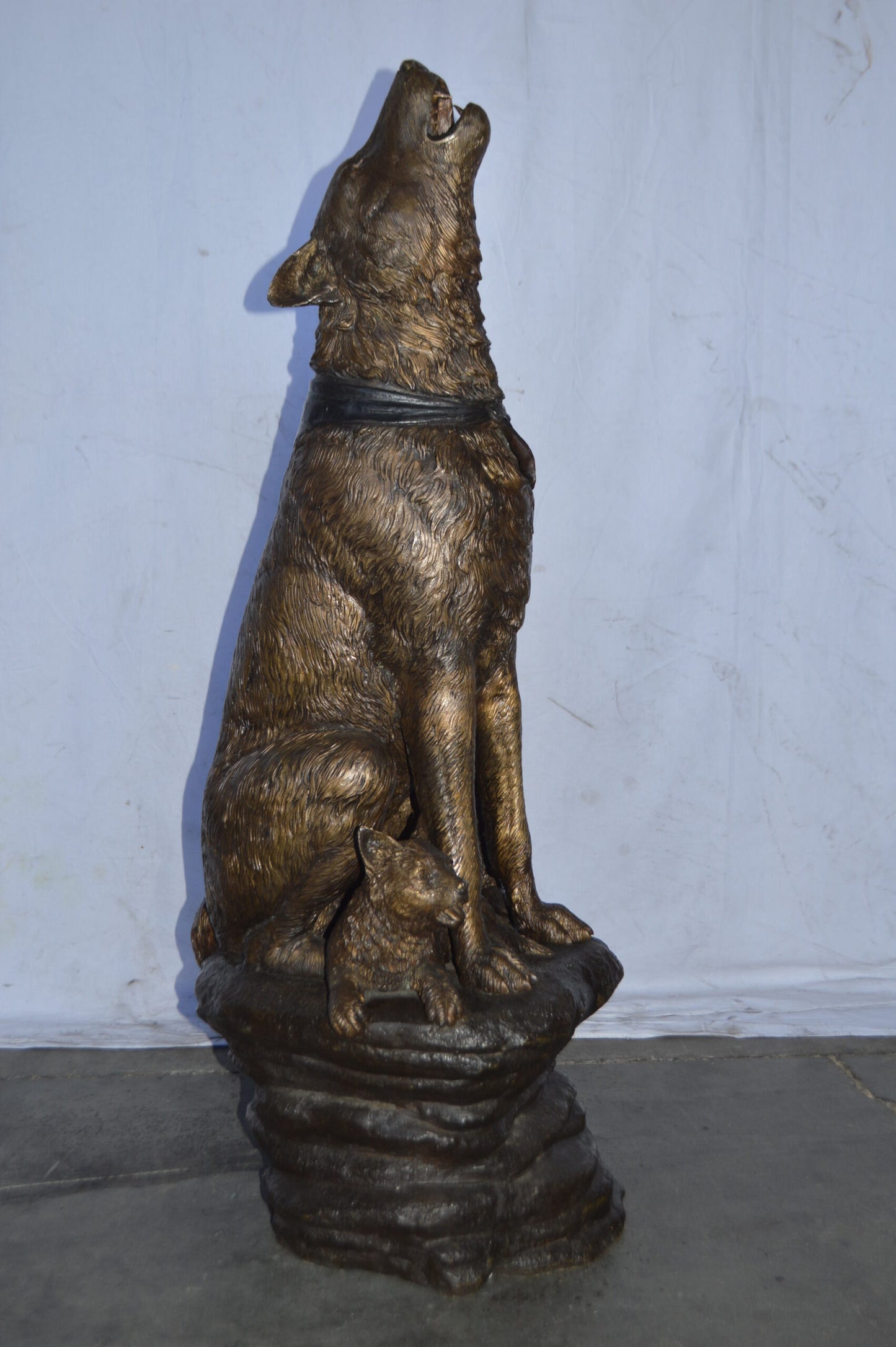 Wolf and her Cubs howling Bronze Statue - Size: 23"L x 20"W x 48"H.