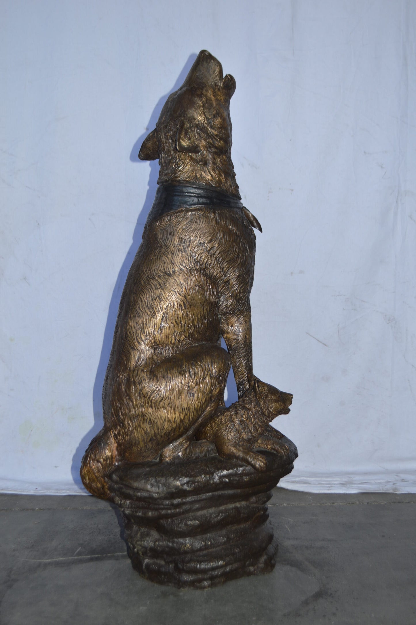 Wolf and her Cubs howling Bronze Statue - Size: 23"L x 20"W x 48"H.