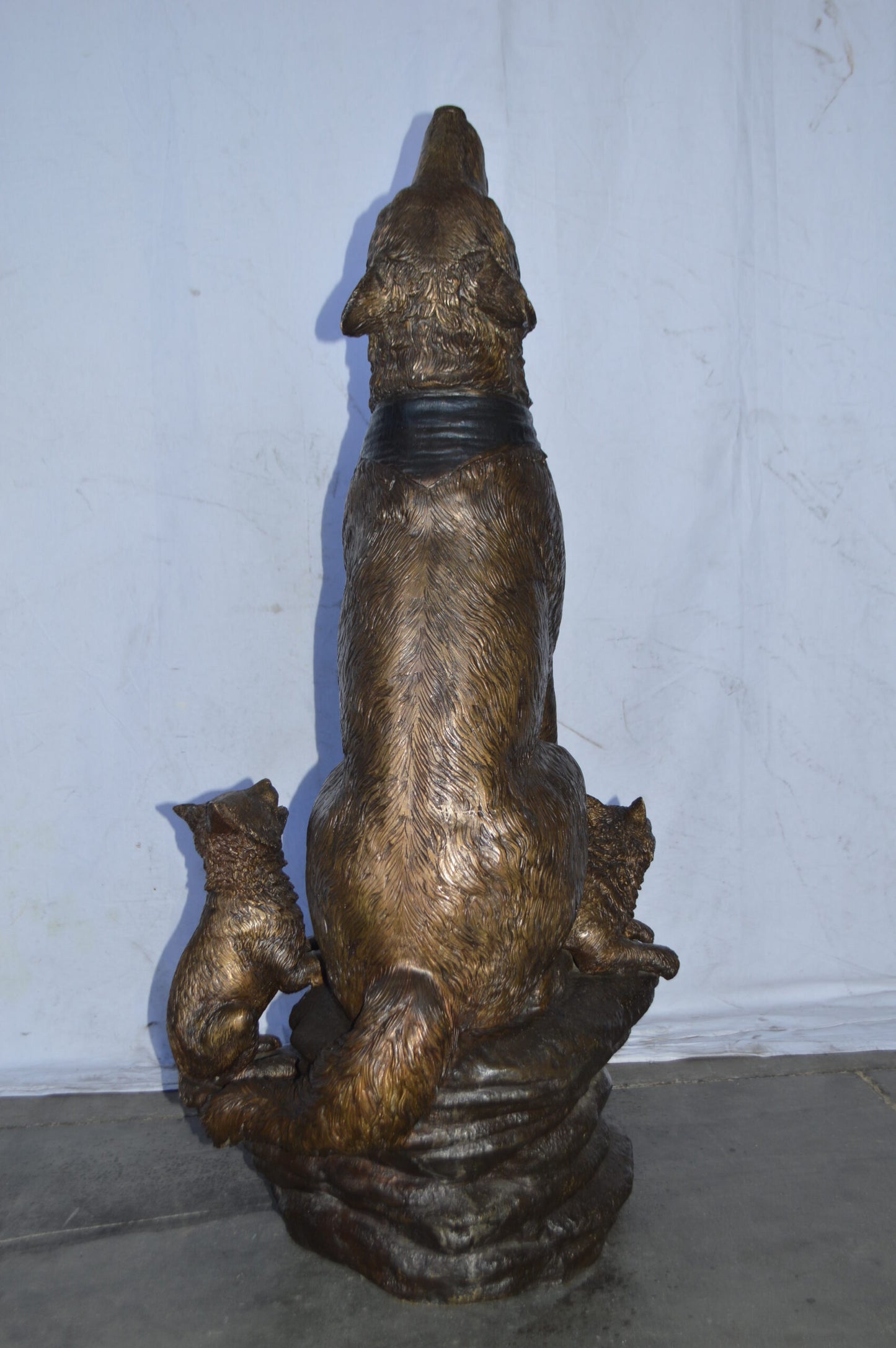 Wolf and her Cubs howling Bronze Statue - Size: 23"L x 20"W x 48"H.