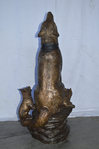 Wolf and her Cubs howling Bronze Statue - Size: 23"L x 20"W x 48"H.