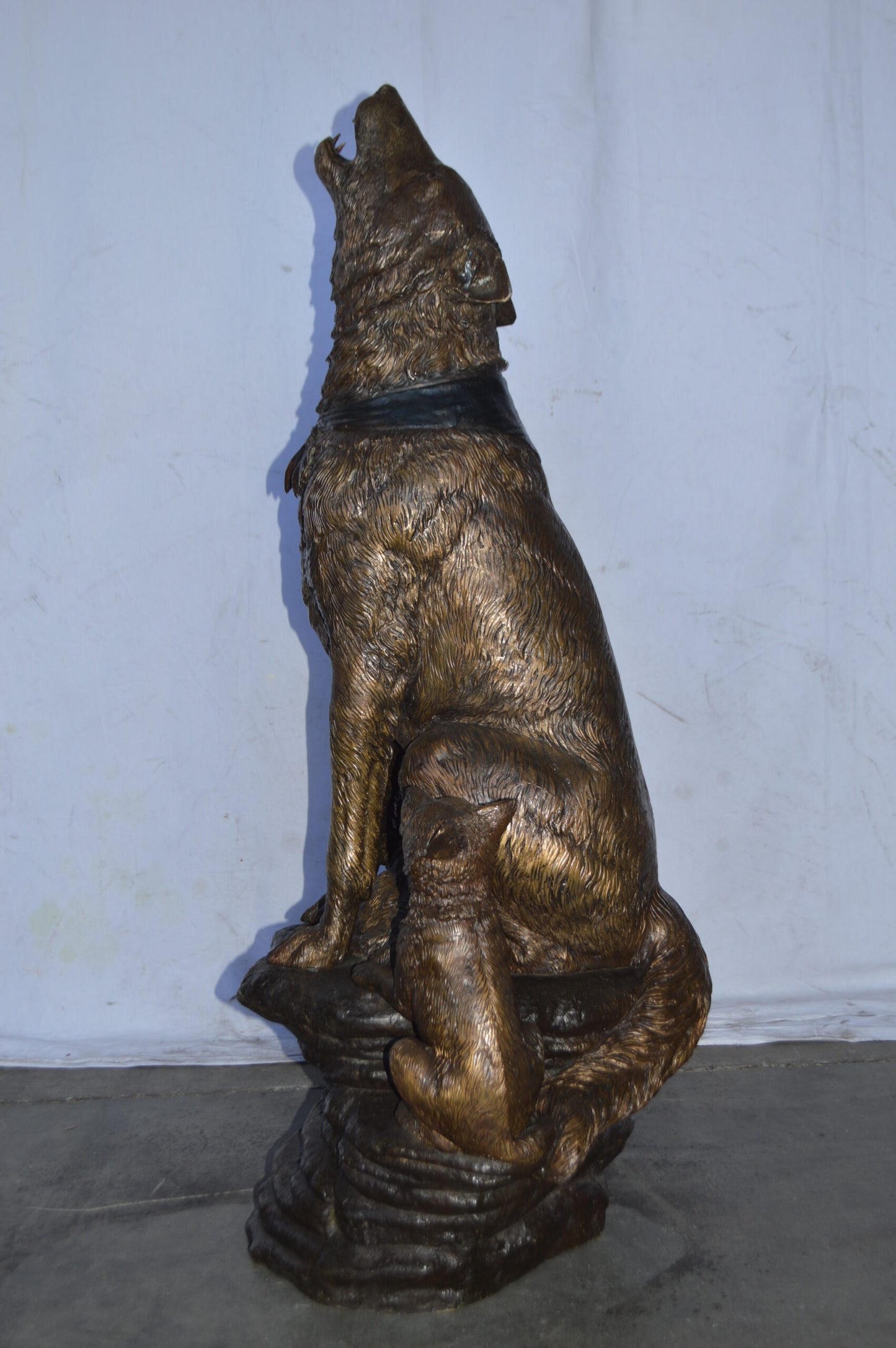 Wolf and her Cubs howling Bronze Statue - Size: 23"L x 20"W x 48"H.