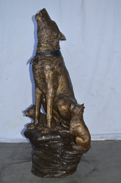 Wolf and her Cubs howling Bronze Statue - Size: 23"L x 20"W x 48"H.