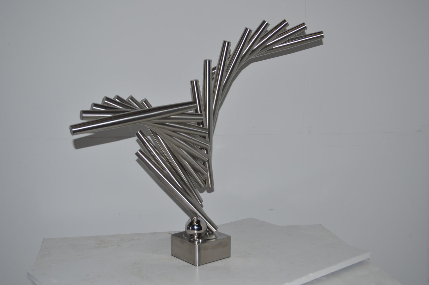 Stainless Steel modern art Table Top decoration - Size: 34"L x 7"W x 23"H.
