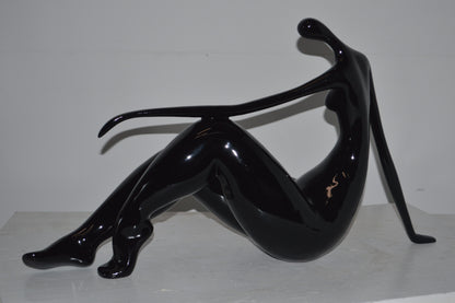 Modern Art Women on the Beach Black Resin Statue - Size: 28"L x 8"W x 16"H.