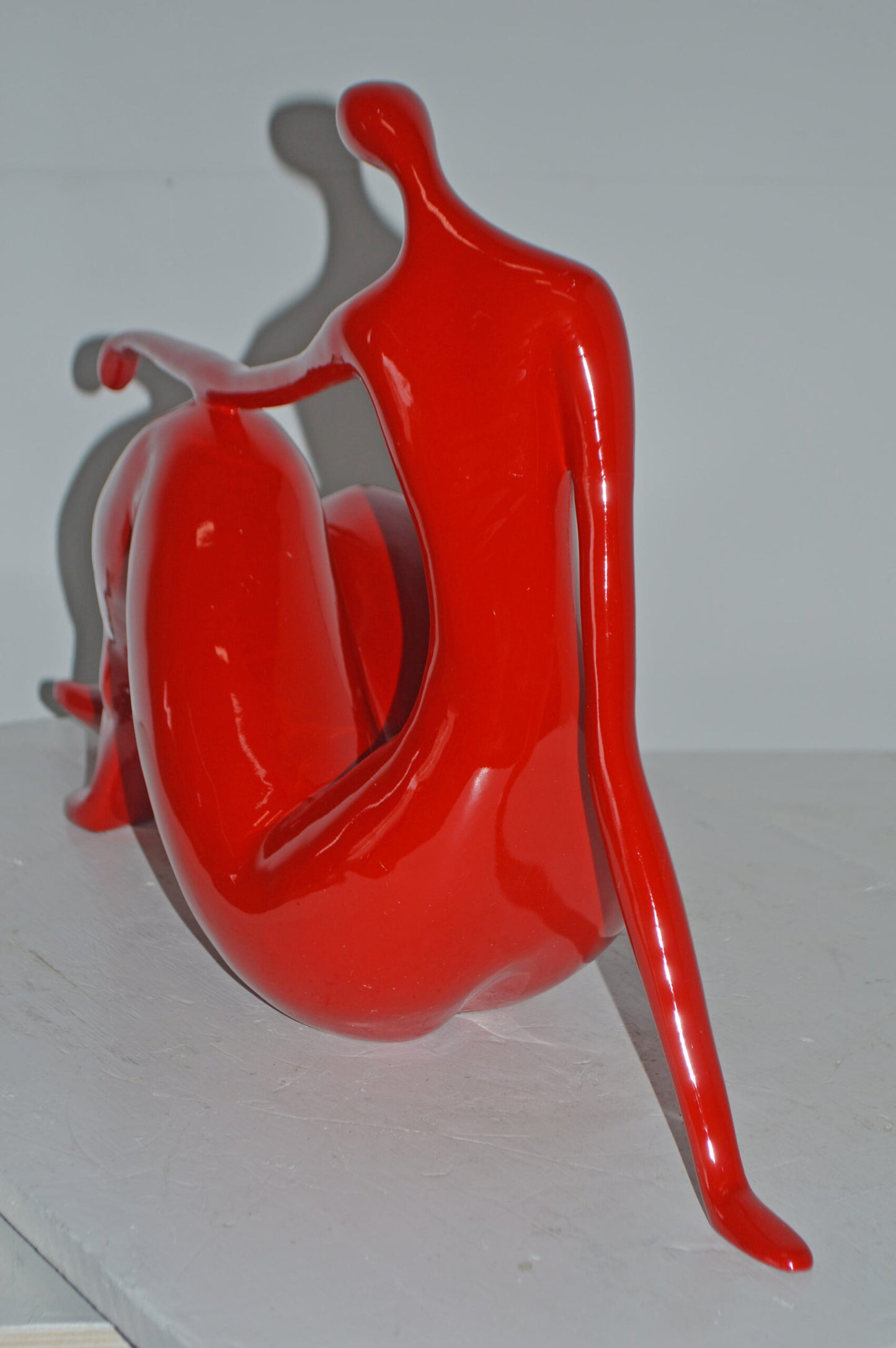 Modern Art Red Women on the Beach Resin Statue - Size: 28"L x 8"W x 16"H.