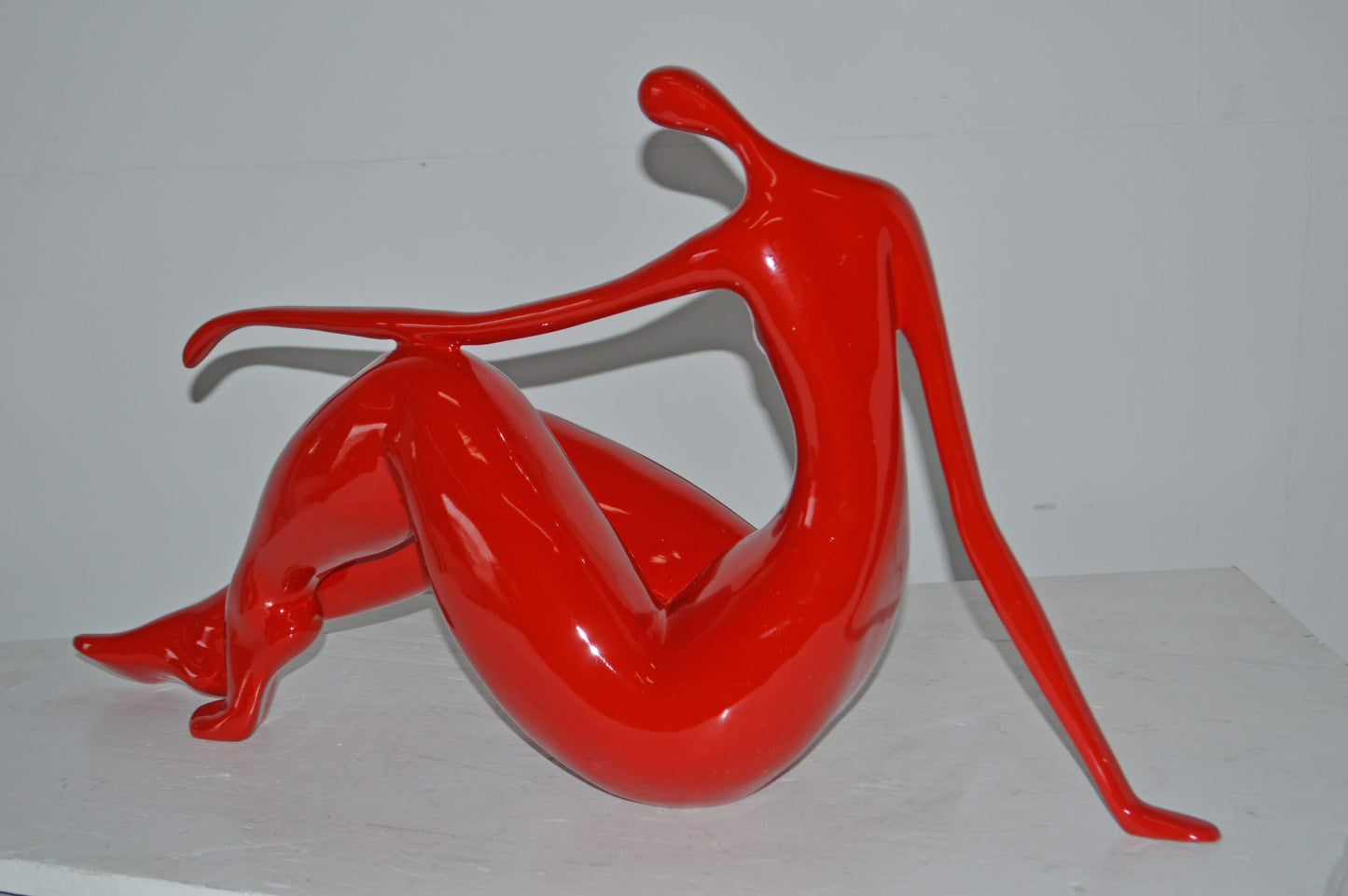 Modern Art Red Women on the Beach Resin Statue - Size: 28"L x 8"W x 16"H.
