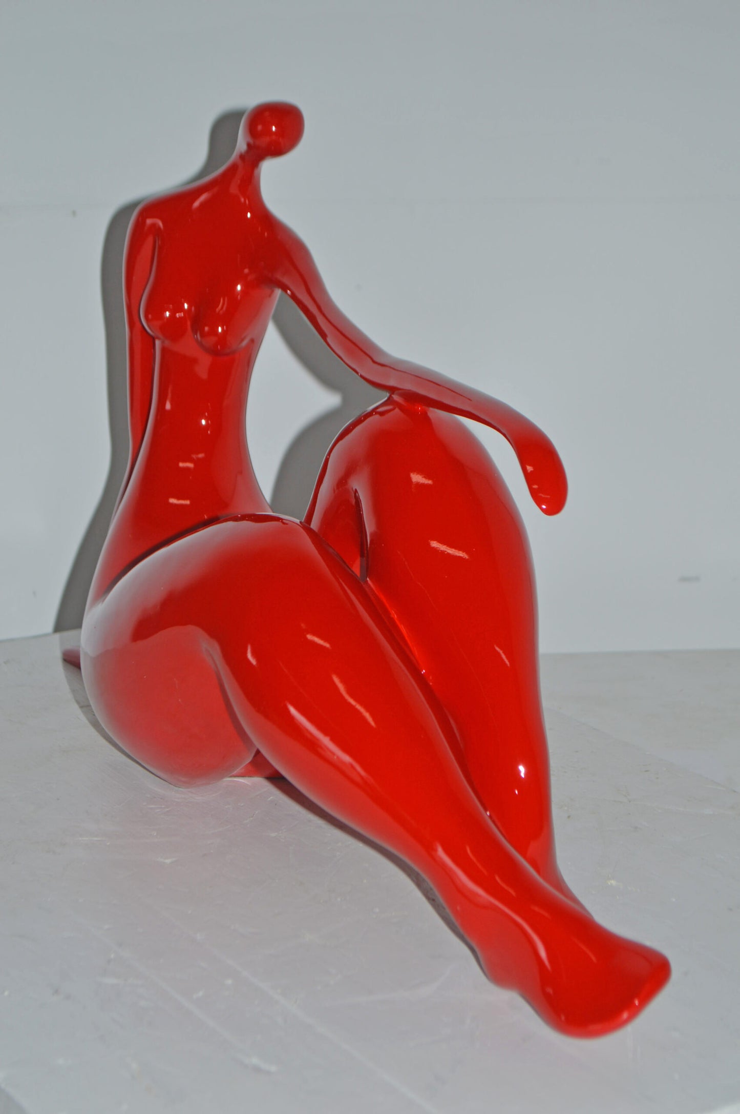 Modern Art Red Women on the Beach Resin Statue - Size: 28"L x 8"W x 16"H.