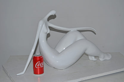 Modern Art Women on the Beach White Resin Statue - Size: 28"L x 8"W x 16"H.