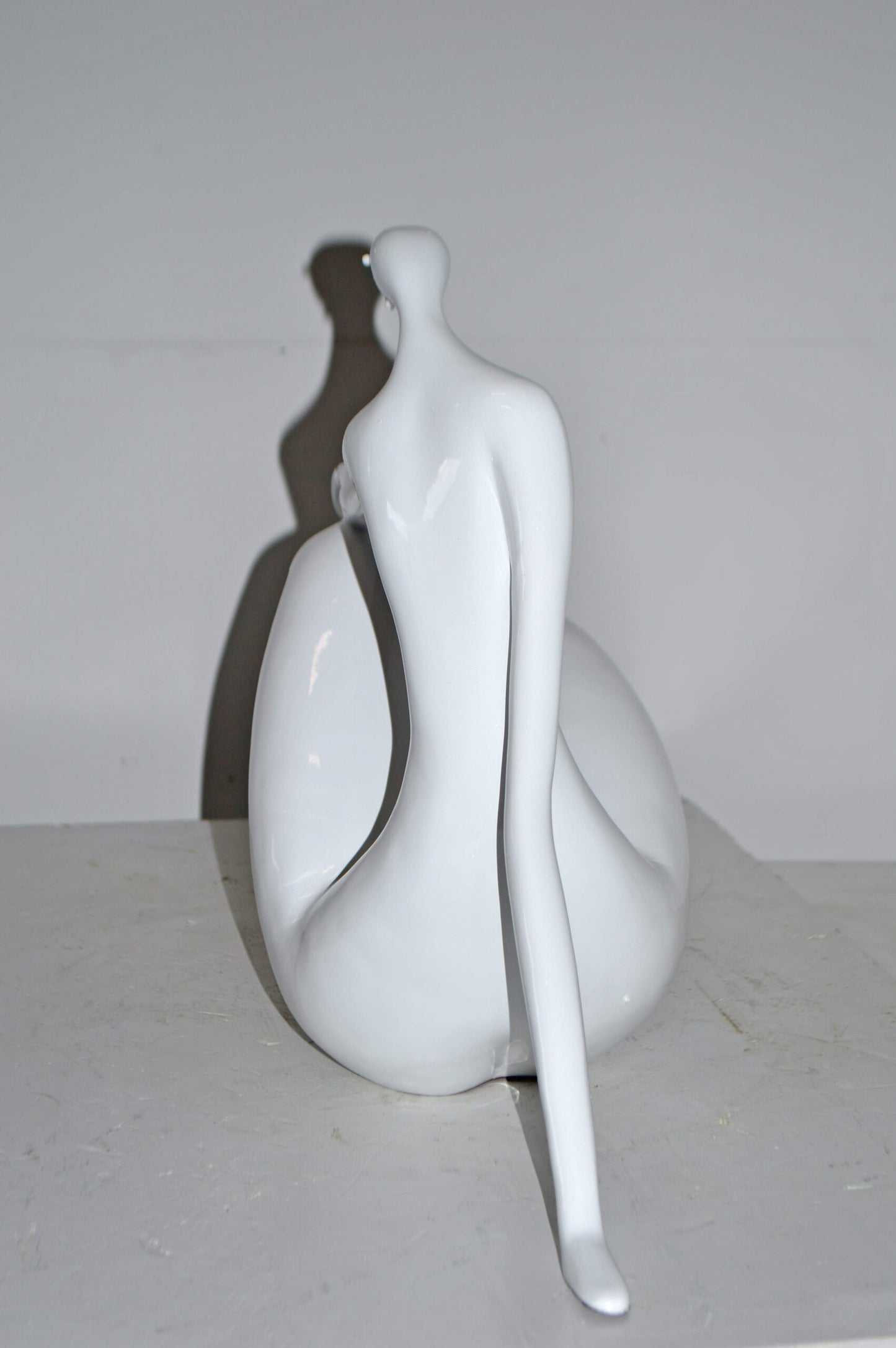 Modern Art Women on the Beach White Resin Statue - Size: 28"L x 8"W x 16"H.