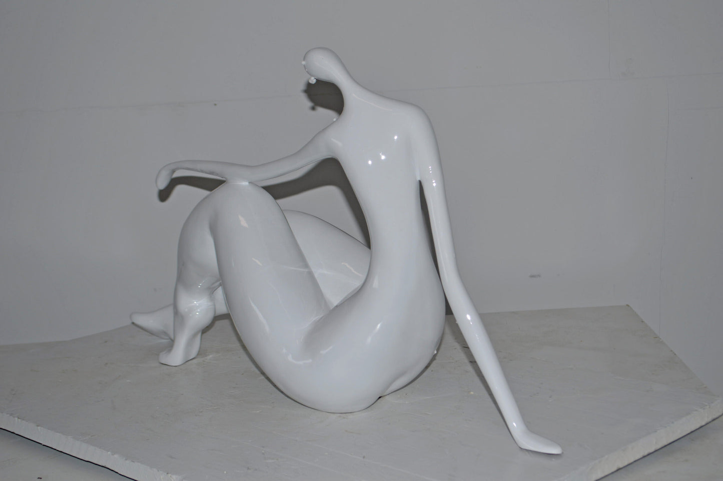Modern Art Women on the Beach White Resin Statue - Size: 28"L x 8"W x 16"H.