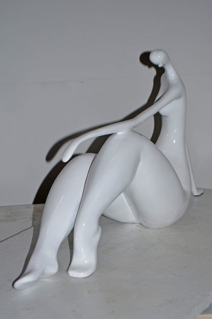 Modern Art Women on the Beach White Resin Statue - Size: 28"L x 8"W x 16"H.