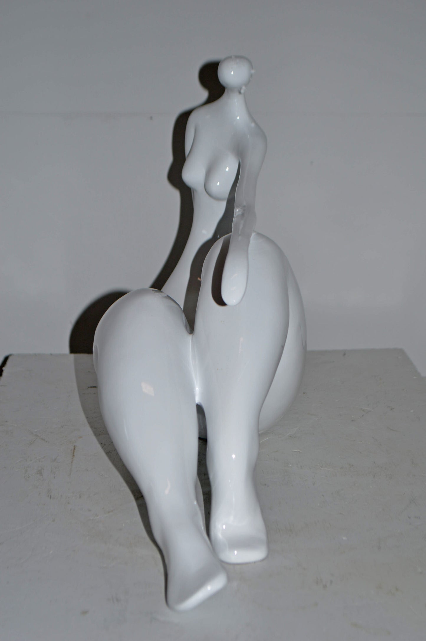 Modern Art Women on the Beach White Resin Statue - Size: 28"L x 8"W x 16"H.