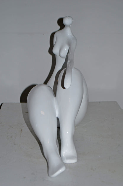 Modern Art Women on the Beach White Resin Statue - Size: 28"L x 8"W x 16"H.