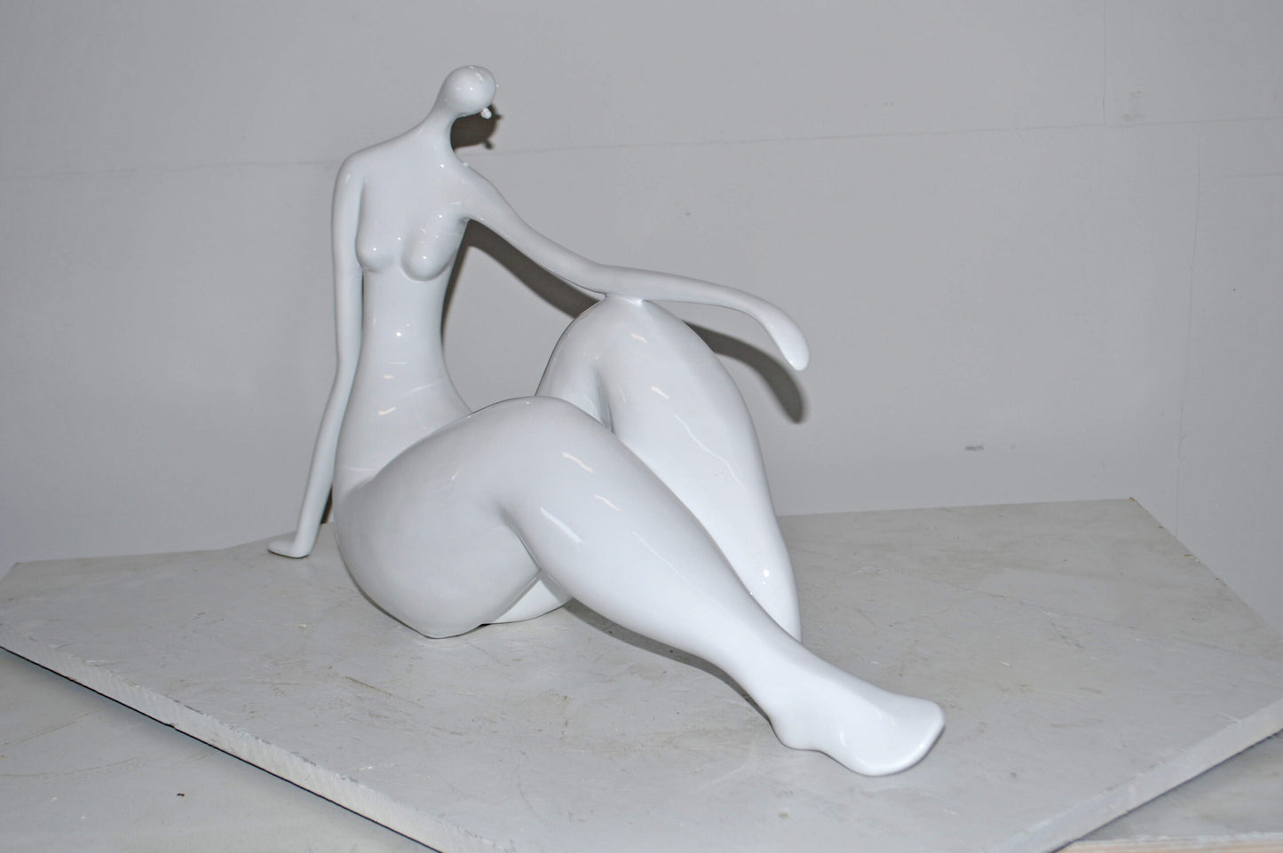 Modern Art Women on the Beach White Resin Statue - Size: 28"L x 8"W x 16"H.