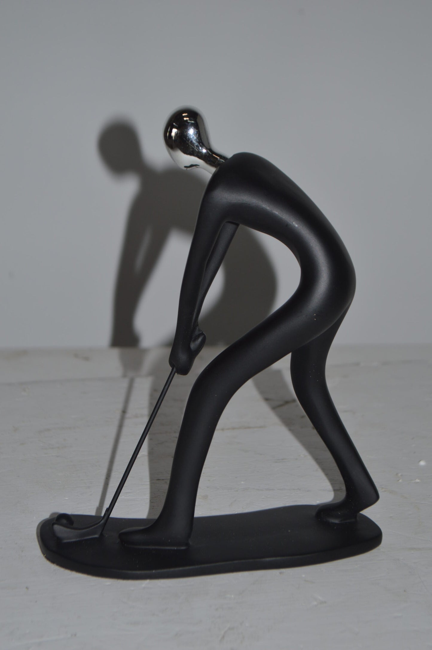 Modern art Black Golfer with Silver Head Resin Statue - Size: 7"L x 2"W x 9"H.
