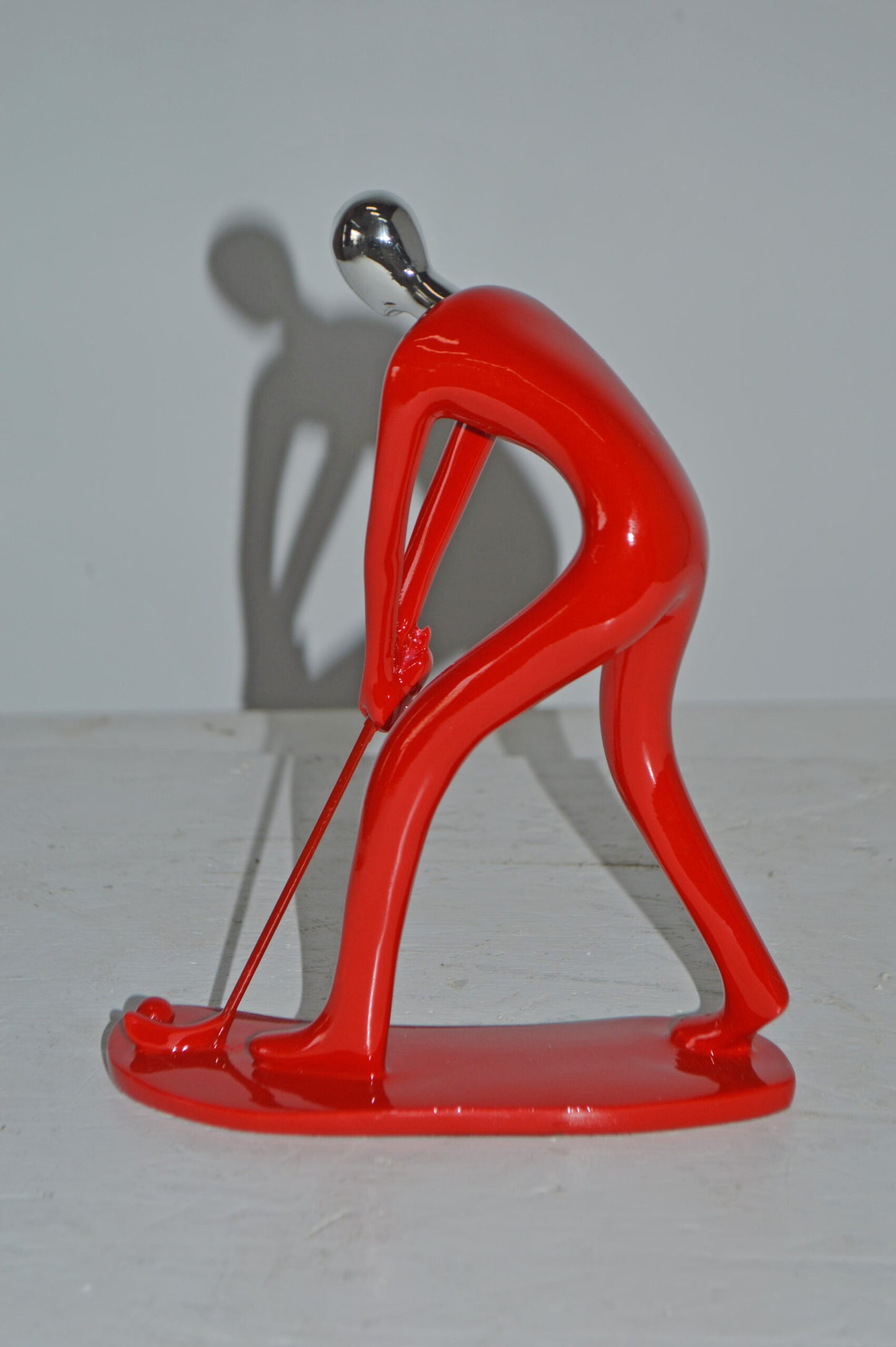 Modern art Red Golfer with Silver Head Resin Statue - Size: 7"L x 2"W x 9"H.