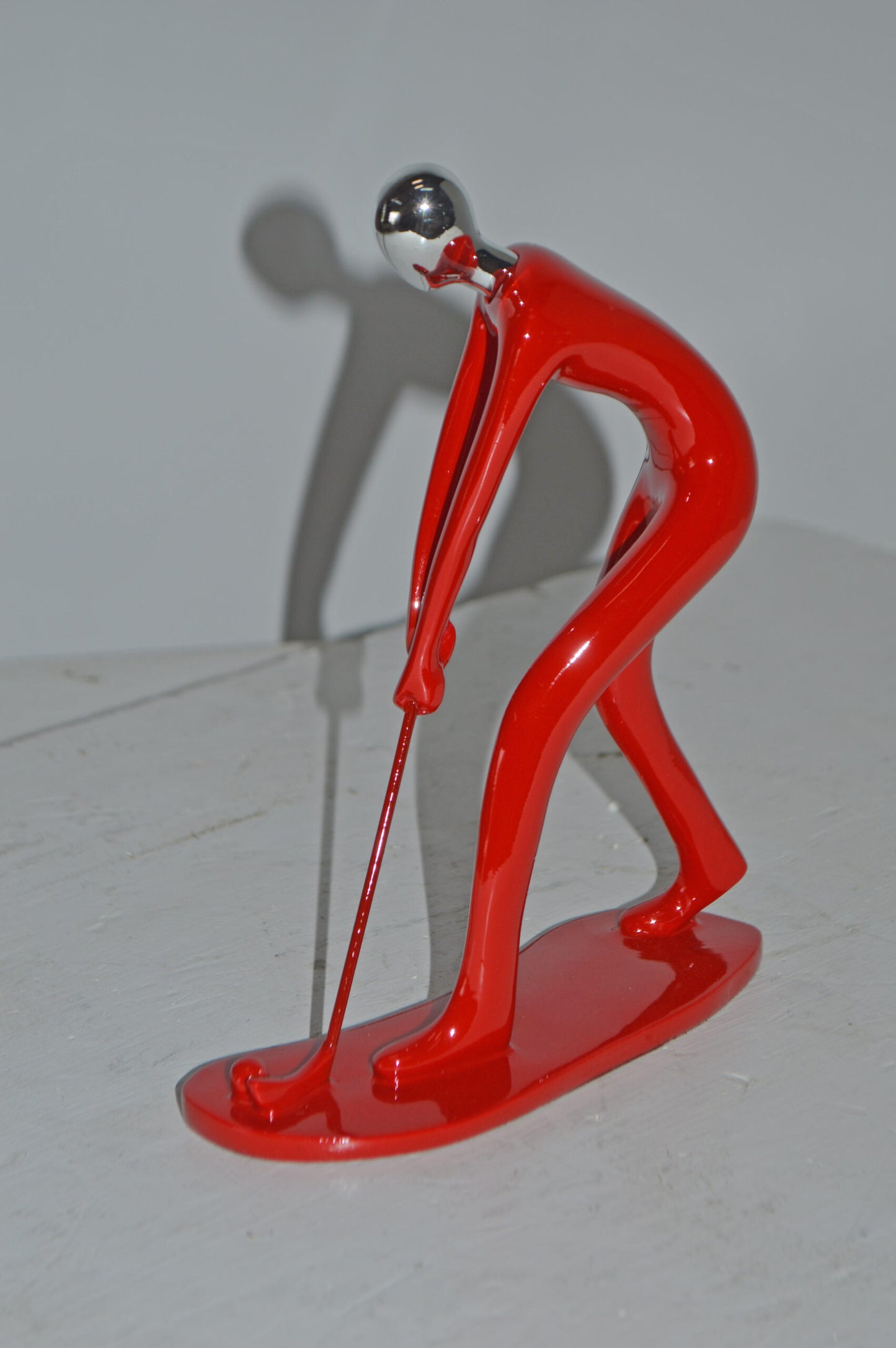 Modern art Red Golfer with Silver Head Resin Statue - Size: 7"L x 2"W x 9"H.