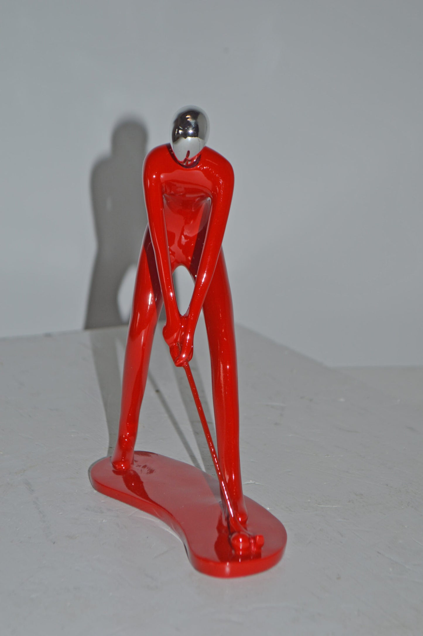 Modern art Red Golfer with Silver Head Resin Statue - Size: 7"L x 2"W x 9"H.