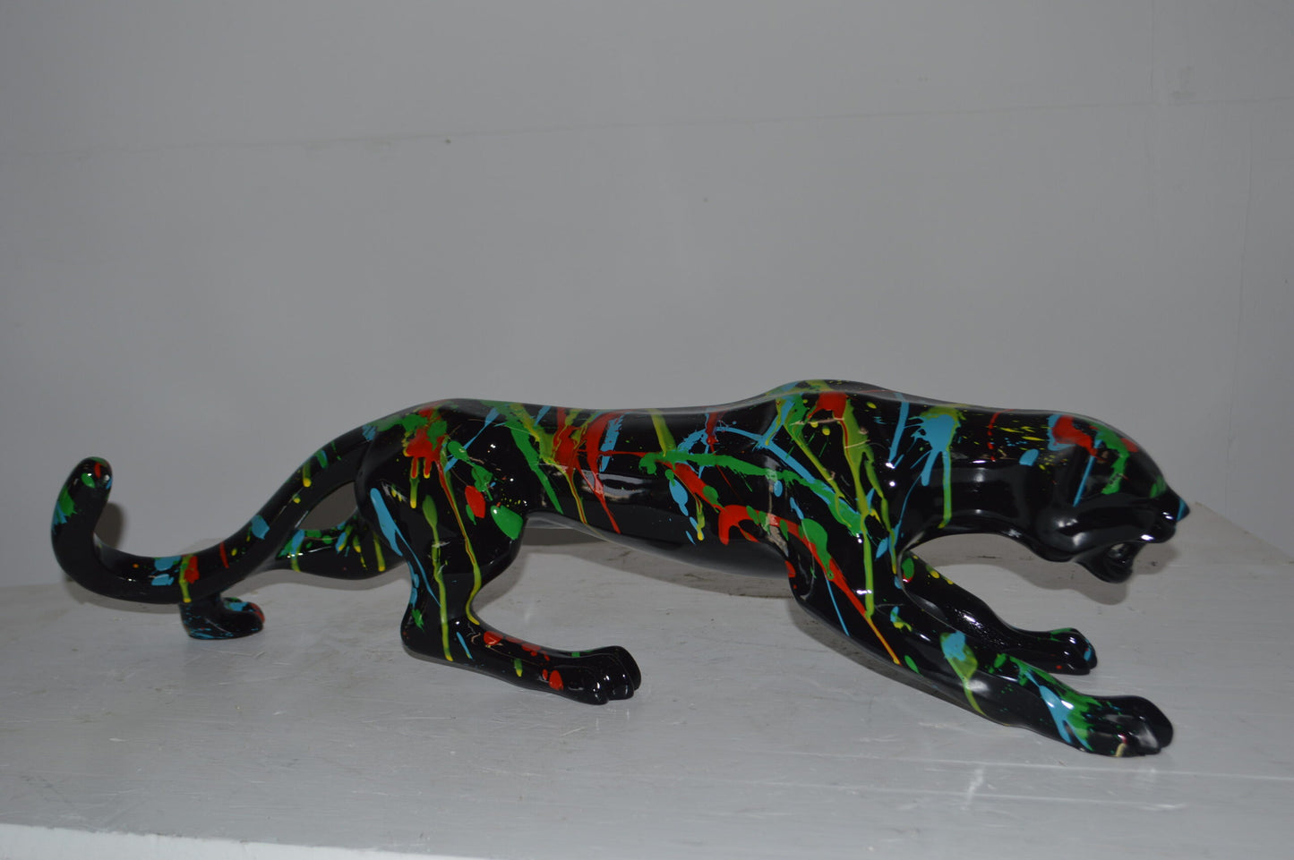 Modern Art Black Jaguar mixed colors Resin Statue - Size: 27"L x 7"W x 7"H.