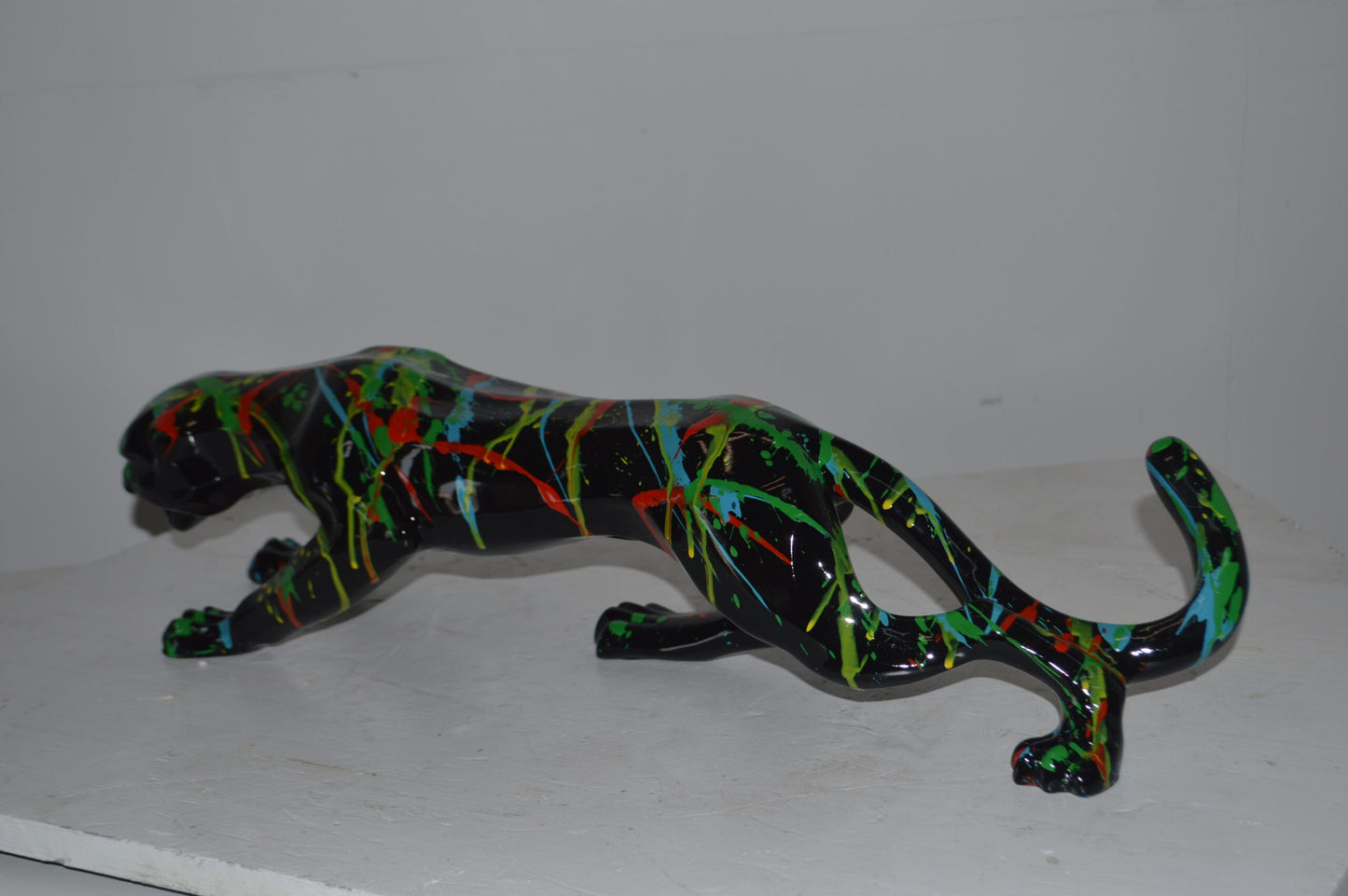 Modern Art Black Jaguar mixed colors Resin Statue - Size: 27"L x 7"W x 7"H.