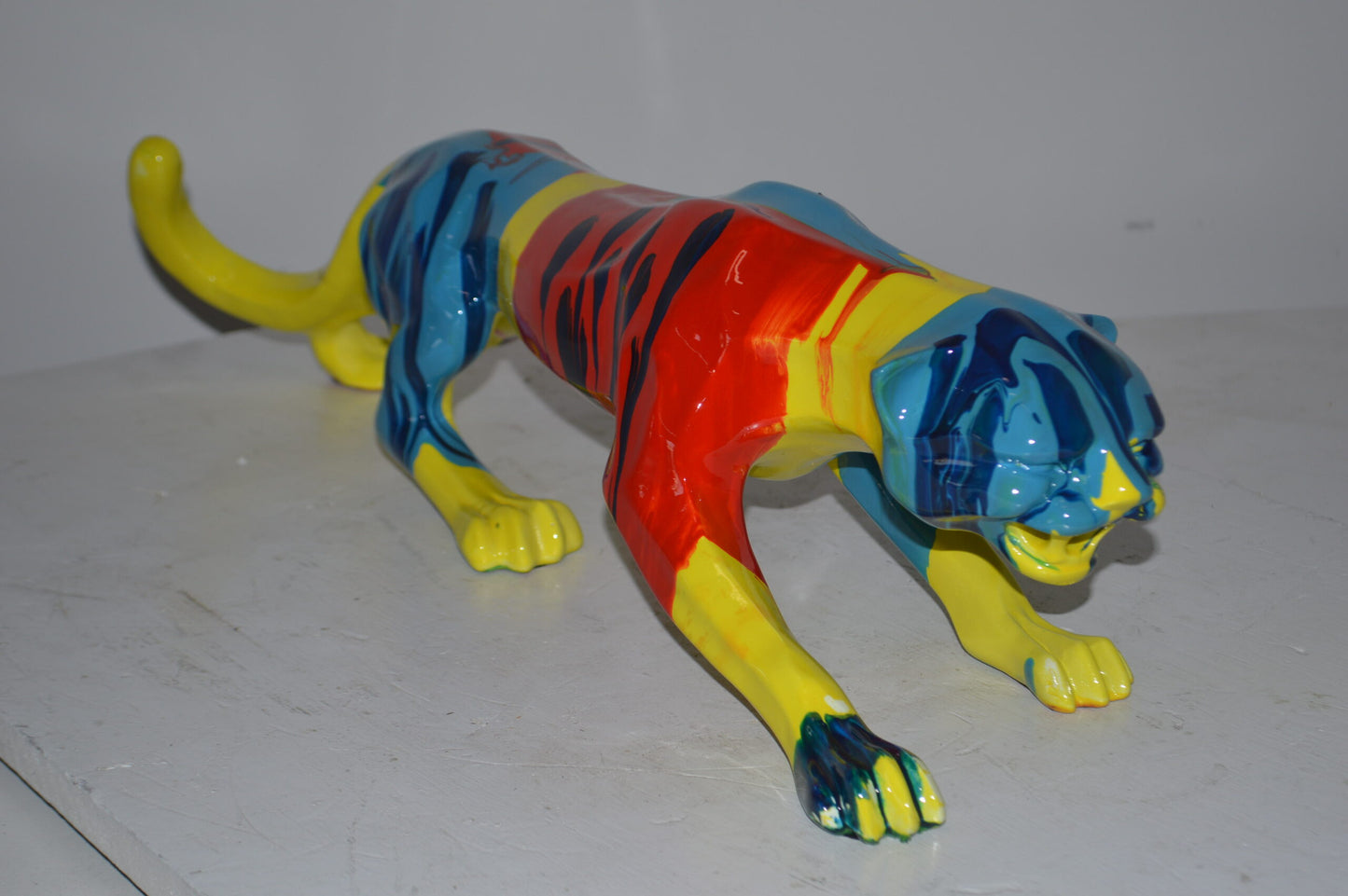 Modern Art Medium Colored Jaguar Statue Made of Resin - Size: 27"L x 7"W x 7"H.