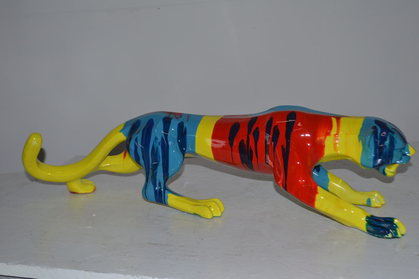 Modern Art Medium Colored Jaguar Statue Made of Resin - Size: 27"L x 7"W x 7"H.
