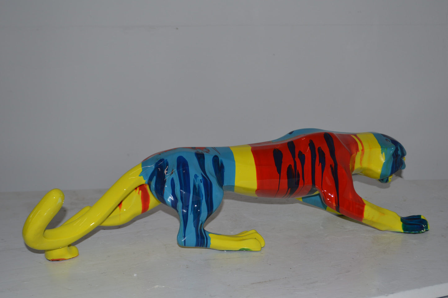 Modern Art Medium Colored Jaguar Statue Made of Resin - Size: 27"L x 7"W x 7"H.