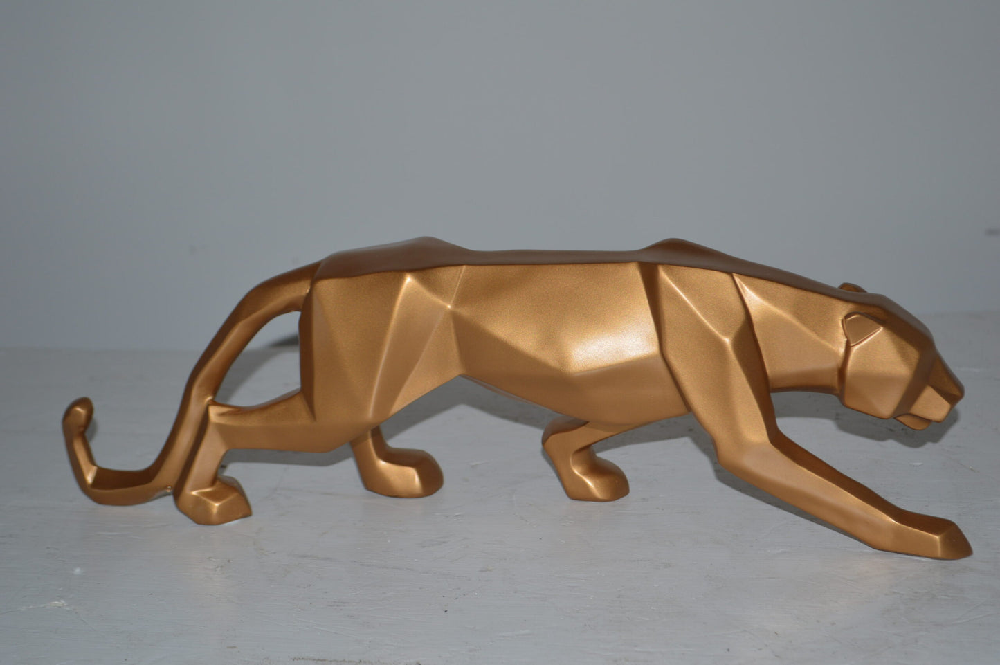 Modern Art Small Gold Jaguar Statue Made of Resin - Size: 17"L x 4"W x 5"H.