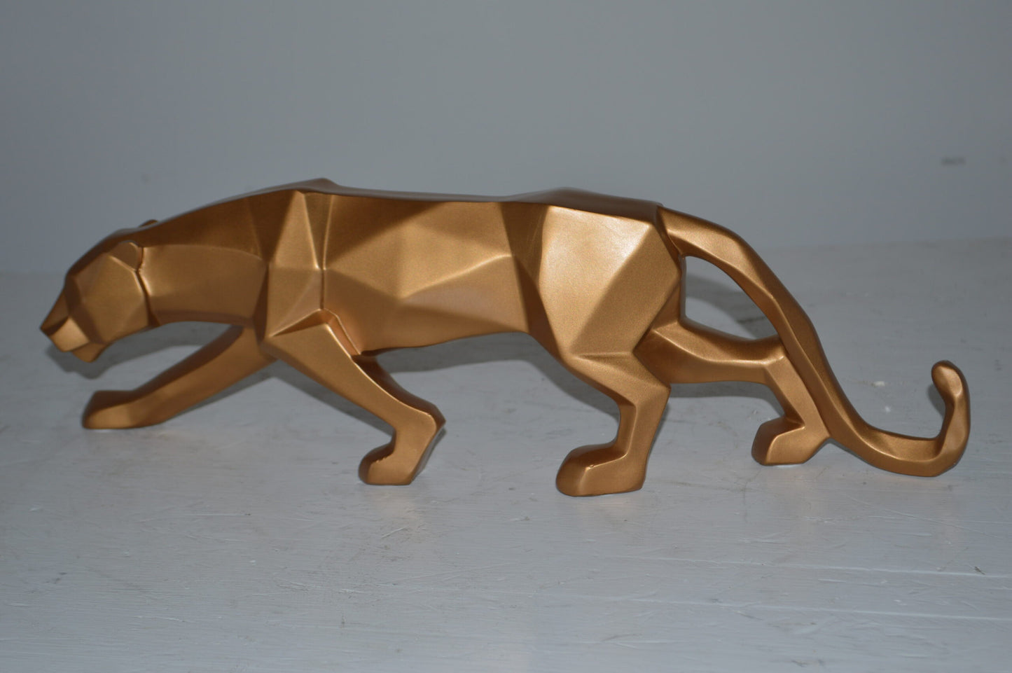 Modern Art Small Gold Jaguar Statue Made of Resin - Size: 17"L x 4"W x 5"H.