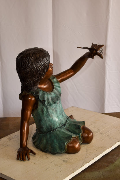 A Little Girl Playing with a Buterfly Bronze Statue 21" x 15" x 19"H