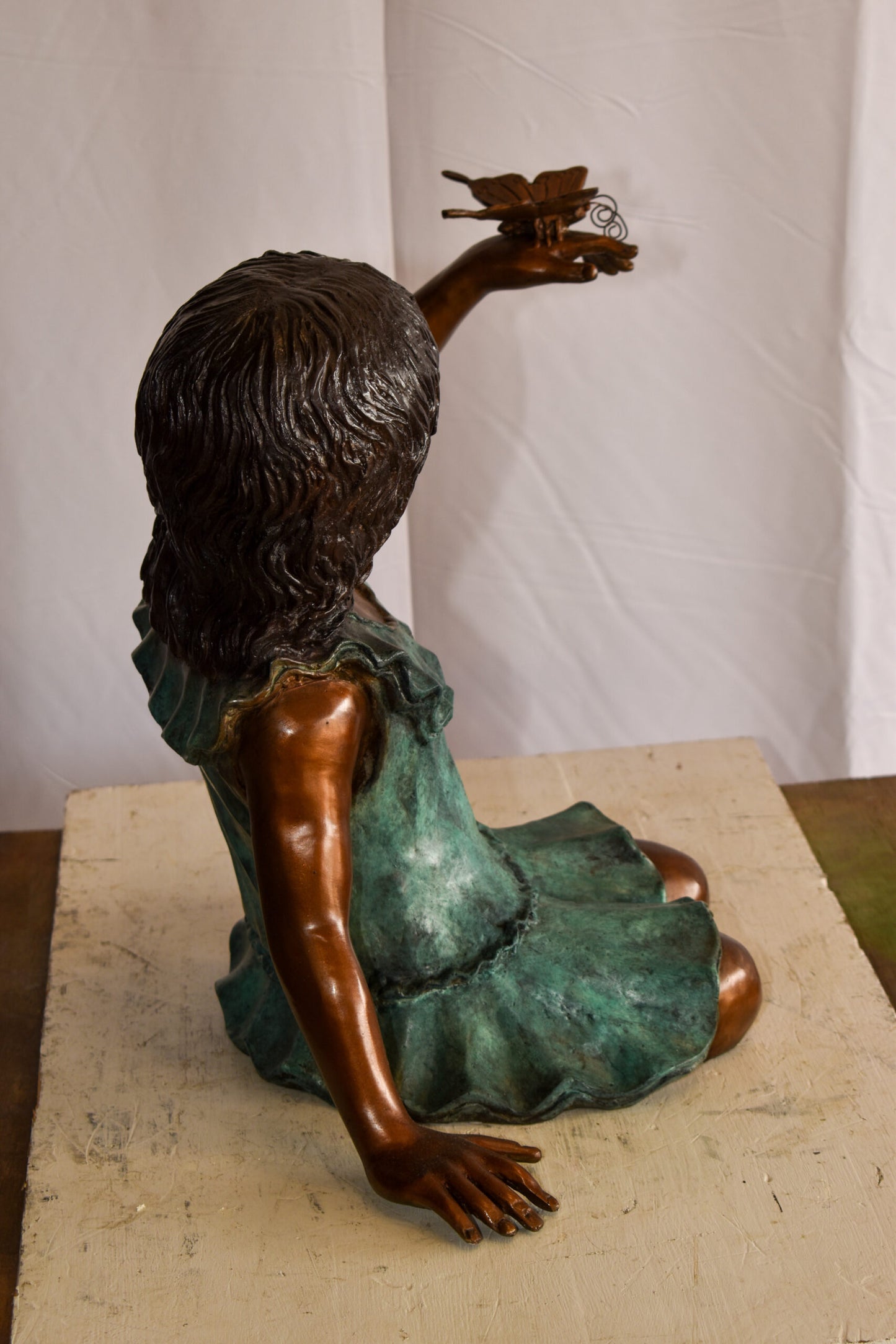 A Little Girl Playing with a Buterfly Bronze Statue 21" x 15" x 19"H
