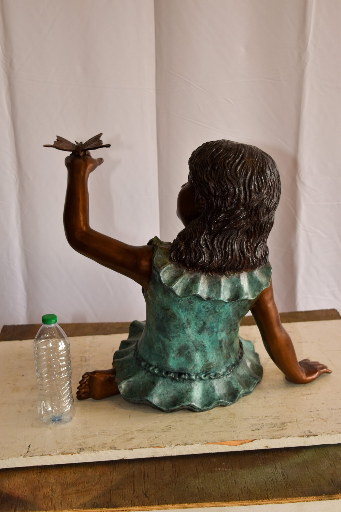 A Little Girl Playing with a Buterfly Bronze Statue 21" x 15" x 19"H
