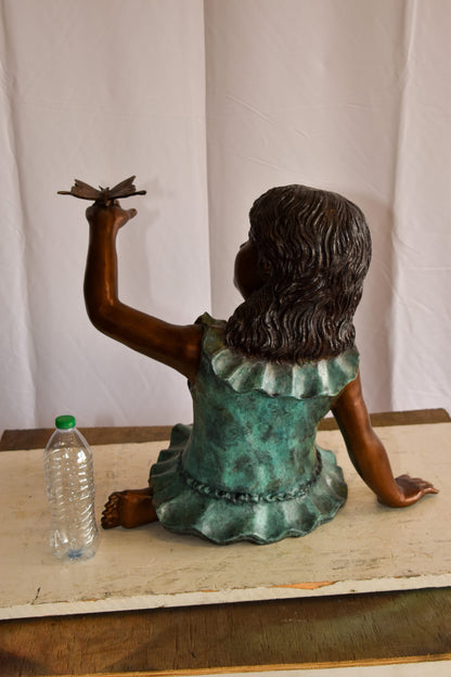 A Little Girl Playing with a Buterfly Bronze Statue 21" x 15" x 19"H