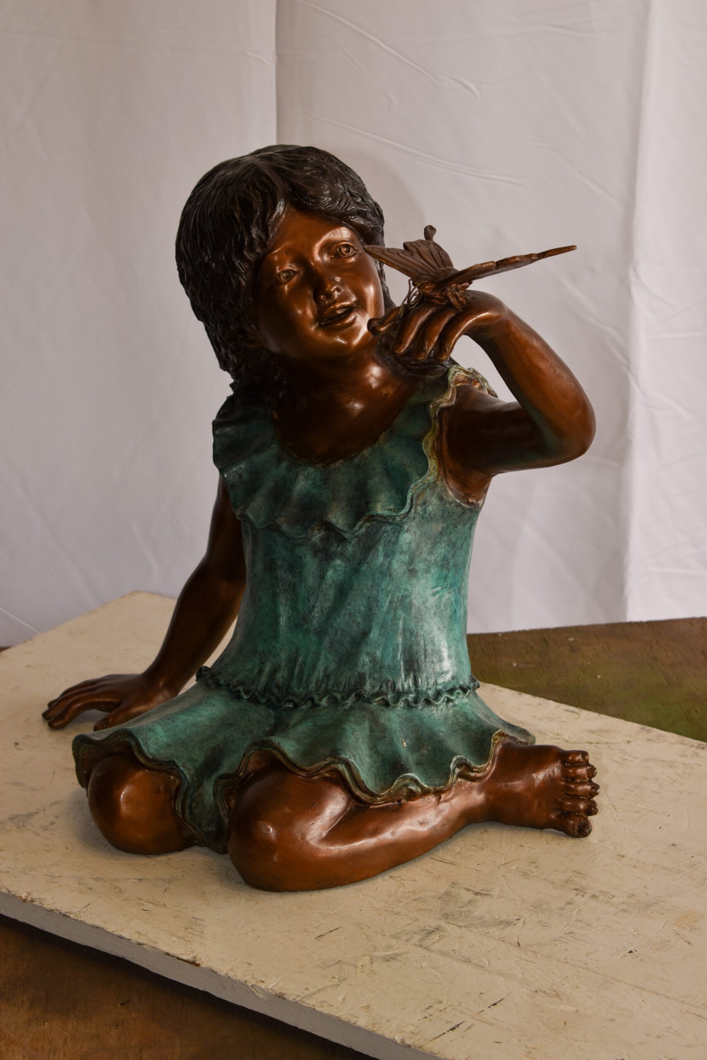 A Little Girl Playing with a Buterfly Bronze Statue 21" x 15" x 19"H