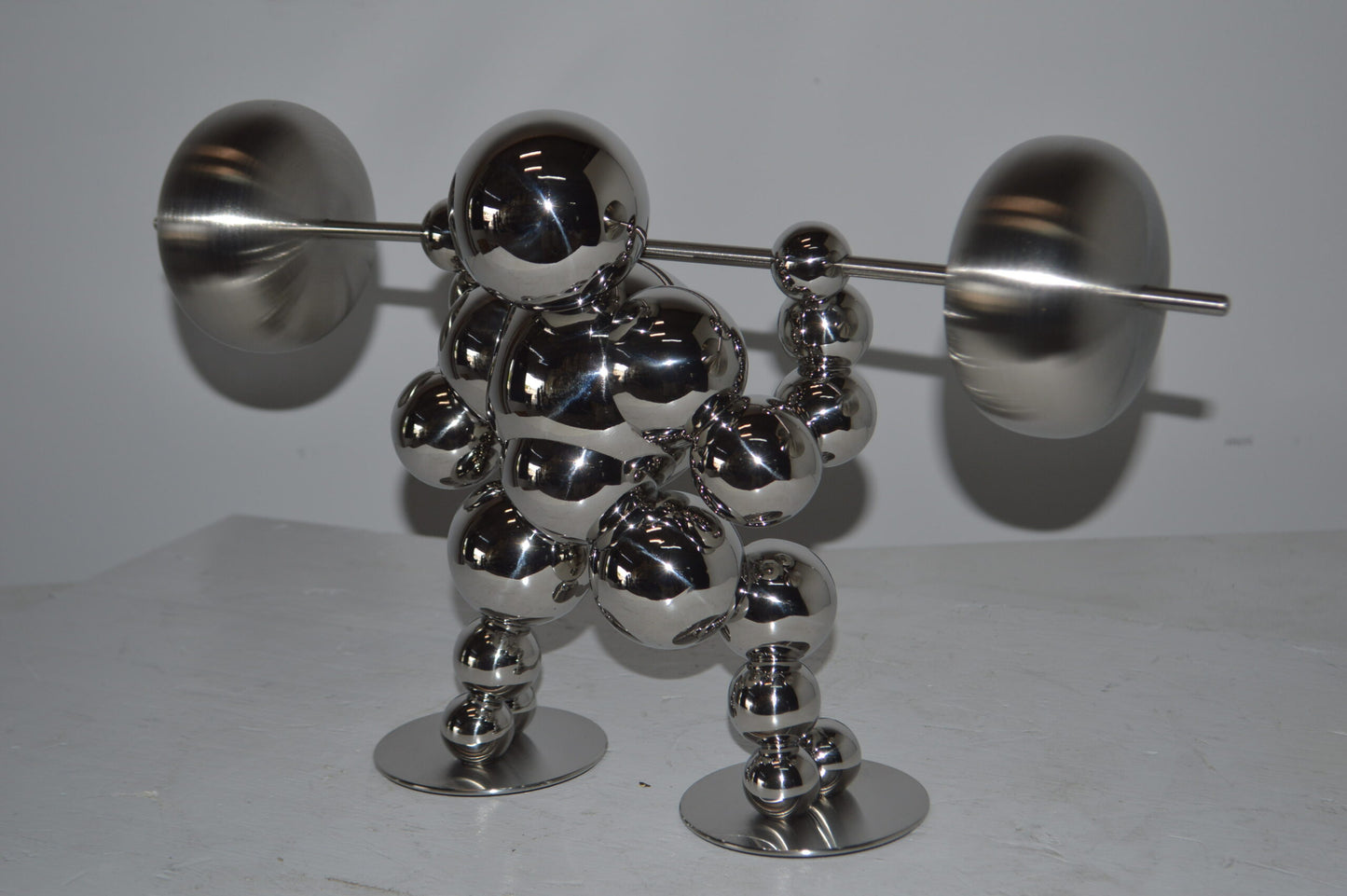 Modern Art Weightlifter Squat Position Chrome Statue - Size: 20"L x 7"W x 12"H.