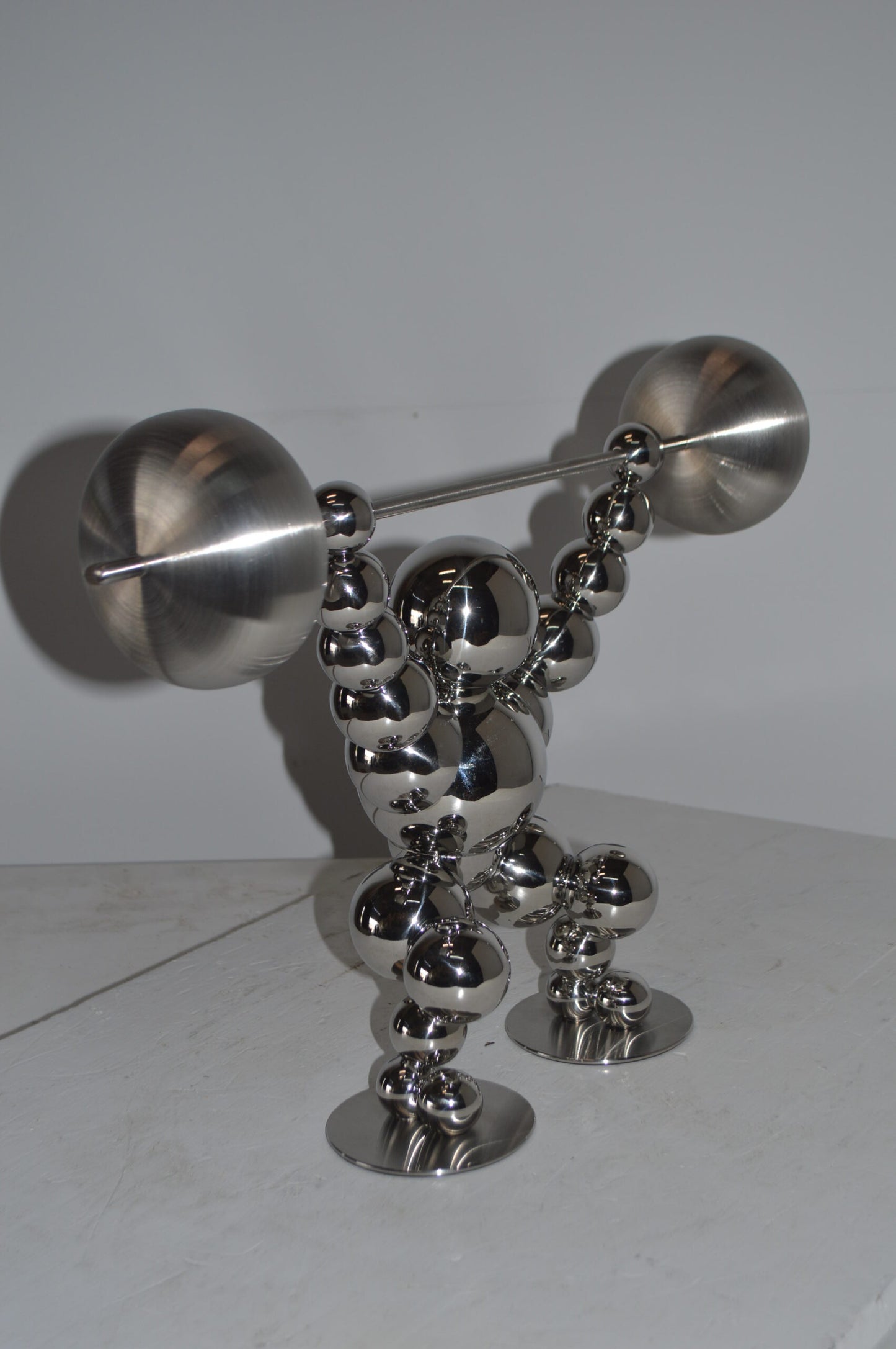 Modern Art Weightlifter Catch Position Chrome Statue - Size: 20"L x 7"W x 15"H.