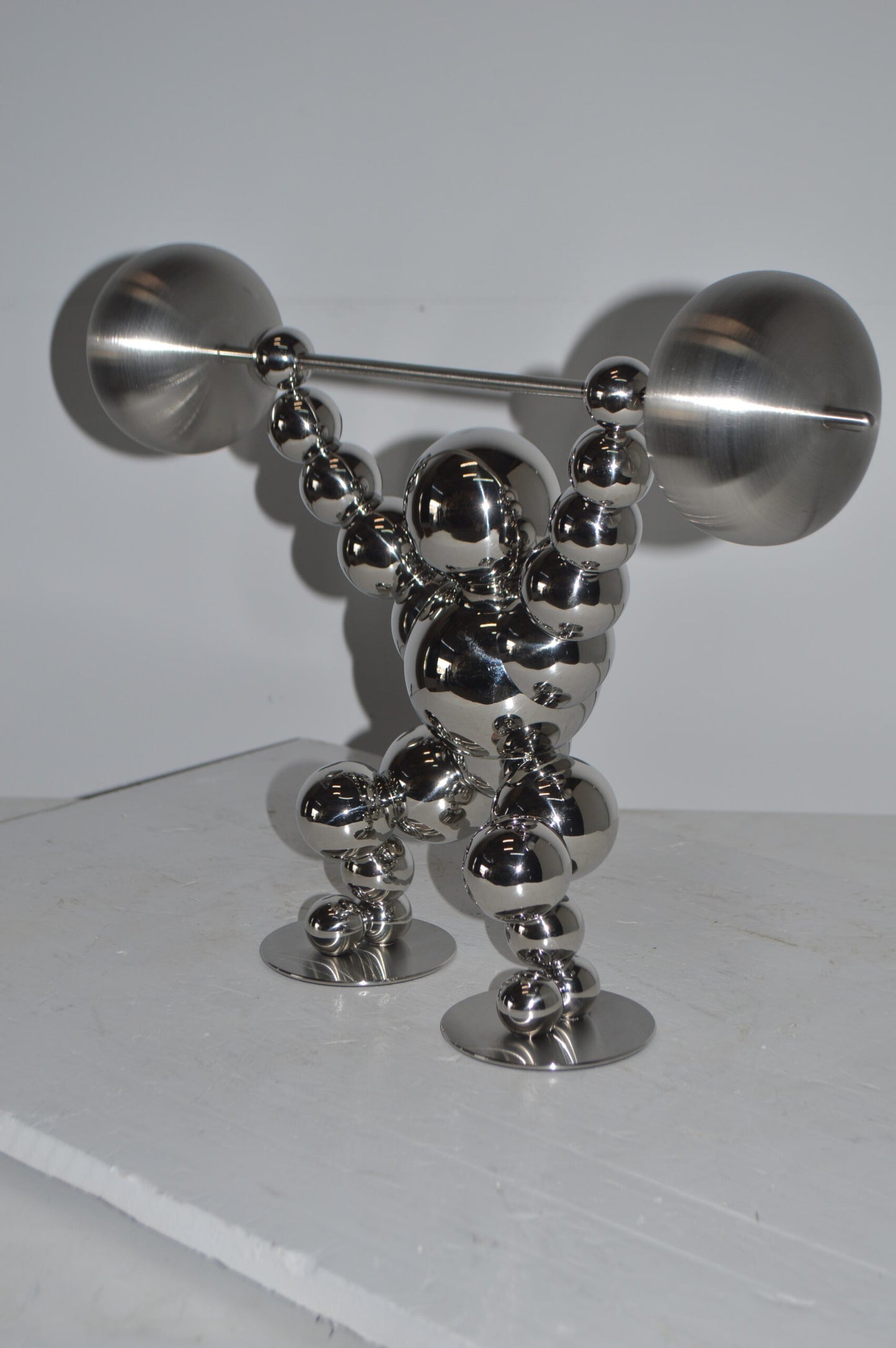 Modern Art Weightlifter Catch Position Chrome Statue - Size: 20"L x 7"W x 15"H.